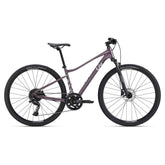 Liv Rove 1 Women's Hybrid Bike 2024 with Shimano CUES U6000 drivetrain and disc brakes, black and silver frame, front and rear views