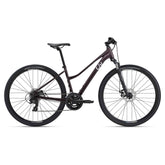 Liv Rove 4 hybrid bike for women with Shimano Tourney drivetrain and disc brakes, featuring a sleek design and sturdy frame.