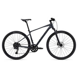 Giant Roam Disc 1 hybrid bike 2024 with Shimano CUES U6000 drivetrain and disc brakes, black and silver frame, ready for urban riding