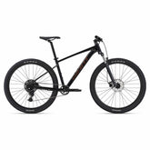 Giant Talon 2 2024 mountain bike with Shimano CUES U4000 drivetrain and disc brakes, featuring a rugged frame and knobby tires.