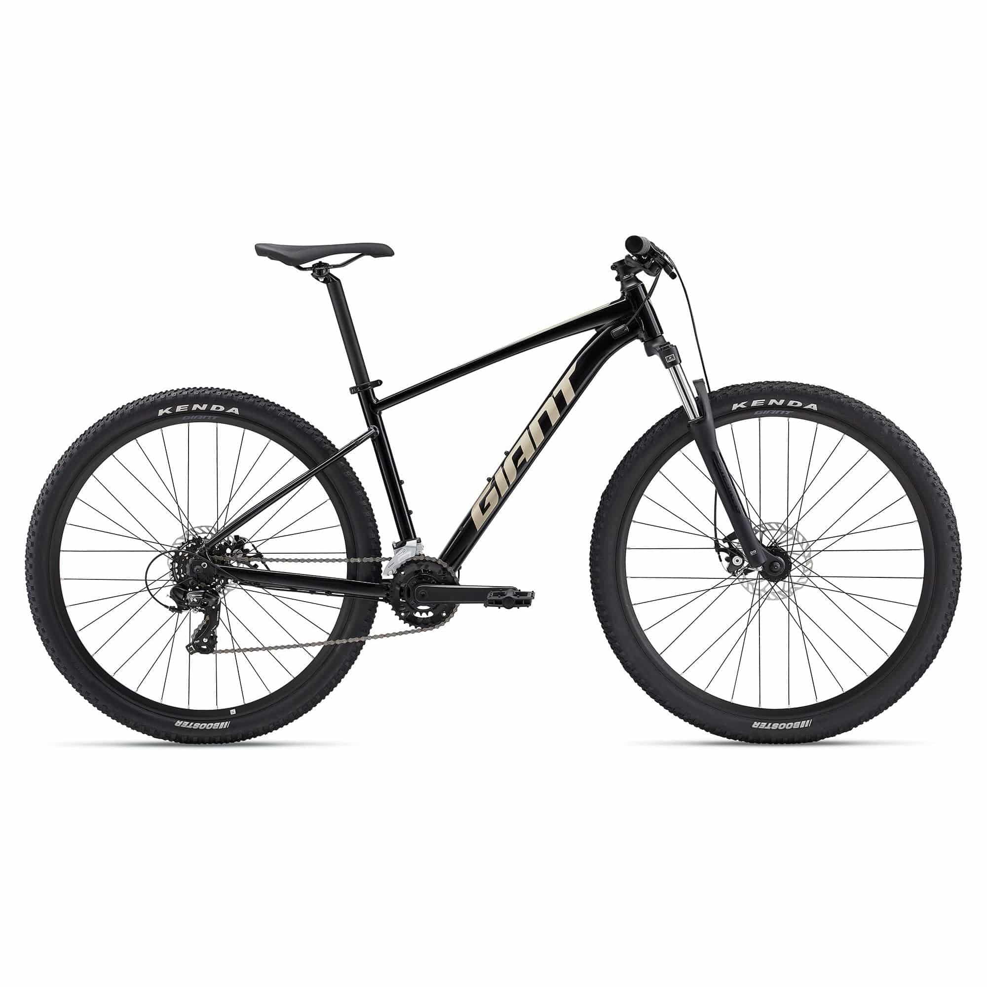 Giant Talon 4 mountain bike with large frame, Shimano Tourney gears, and disc brakes, ready for off-road riding.