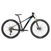Liv Tempt 0 2024 women's mountain bike with Shimano Deore M6100 groupset and disc brakes, ready for off-road riding.