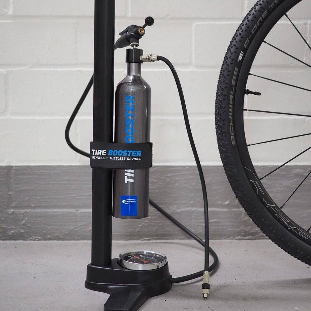 Schwalbe Tyre Booster hand pump for rapid tubeless tyre inflation and assembly, accessory for bicycle maintenance.