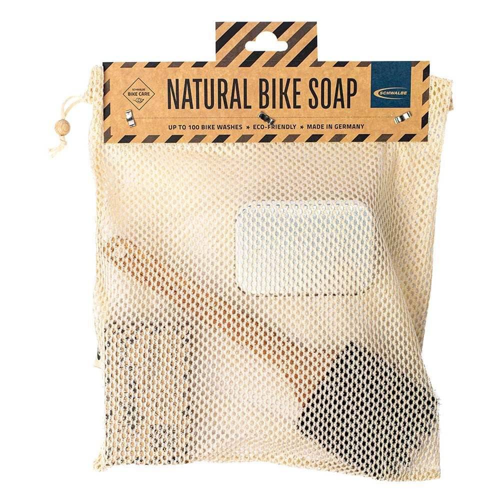 Schwalbe tubeless bike soap kit components with biodegradable cleaner, eco-friendly bike maintenance products in image.