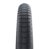 Schwalbe Big Apple K-Guard puncture-resistant balloon bike tyre with reflective sidewalls, suitable for city and touring bicycles.