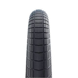 Schwalbe Big Apple K-Guard puncture-resistant balloon bike tire with reflective sidewalls for urban cycling.