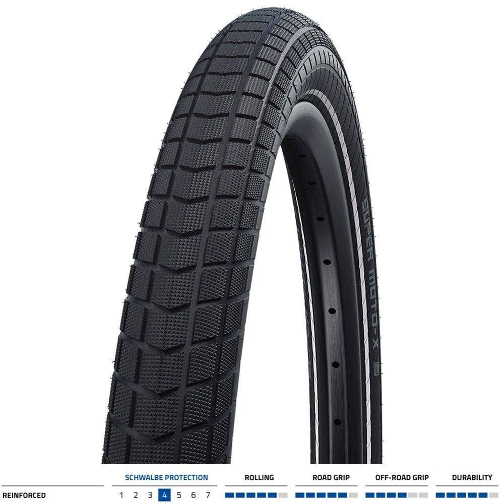 Schwalbe Super Moto-X E-Bike tyre with green puncture protection guard and tread pattern for off-road riding.