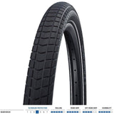 Schwalbe Super Moto-X E-Bike tyre with green puncture protection guard and tread pattern for off-road riding.