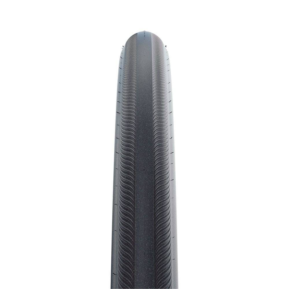Schwalbe Rightrun K-Guard wheelchair tyre with Kevlar puncture protection, showing the tread pattern and sidewall branding.