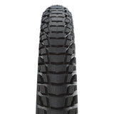 Schwalbe Marathon Plus Tour SmartGuard puncture-resistant e-bike tire with reflective sidewalls and robust tread for durability.