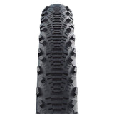 Schwalbe Cx Comp tyre with K-Guard puncture protection and LiteSkin sidewalls, displaying tread pattern and sidewall details.