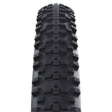 Schwalbe Smart Sam Plus Greenguard E-MTB tyre with snakeskin tread and puncture protection, designed for mountain biking components.