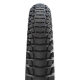 Schwalbe Marathon Plus Tour puncture-resistant touring bike tyre with dualguard casing, shown in close-up view.