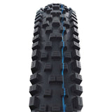 Schwalbe Nobby Nic Super Ground MTB folding tire with tubeless E-bike compatibility, designed for speed grip on mountain biking trails.