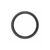 Pirelli P Zero Race high-performance road cycling racing tyre, close-up of black tyre with tread pattern and branding.