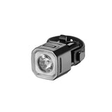Giant Recon HL100 waterproof bike front light with power indicator, mounted on a bicycle handlebar for improved visibility.