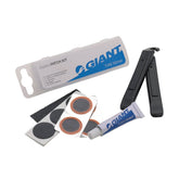Giant bicycle tyre patch kit with accessories for quick inner tube repairs, featuring patches, glue, and tools.