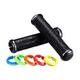 Giant Tactal double lock-on mountain bike grips with vibration reduction, featuring textured rubber surfaces for improved grip and comfort.