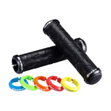 Giant Tactal double lock-on mountain bike grips with vibration reduction, featuring textured rubber surfaces for improved grip and comfort.