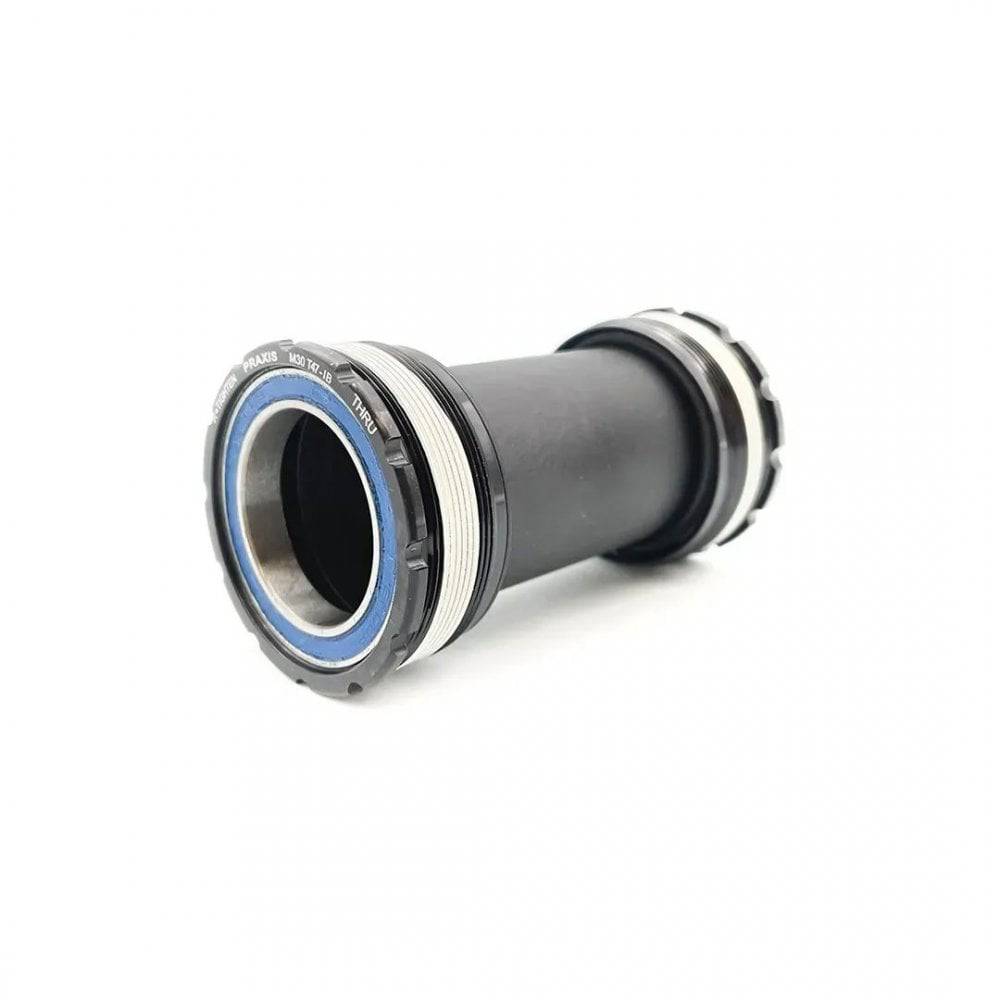 Praxis Works M30 Thru BB T47 internal bottom bracket for high-performance bicycle cranksets, showing the sleek component design.
