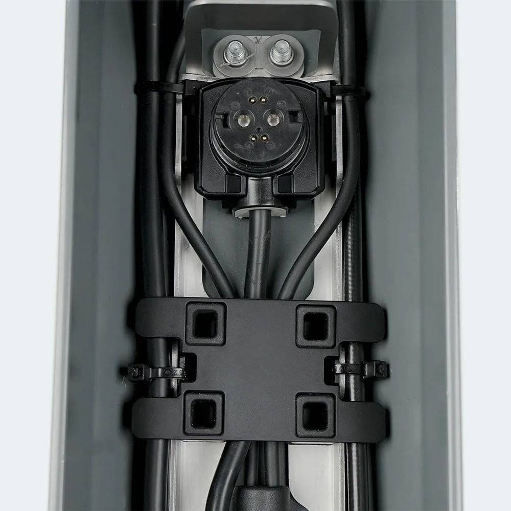 Fazua FAZUA RIDE 60 rack cover for e-bike cable protection and organization, shown on a black e-bike component.