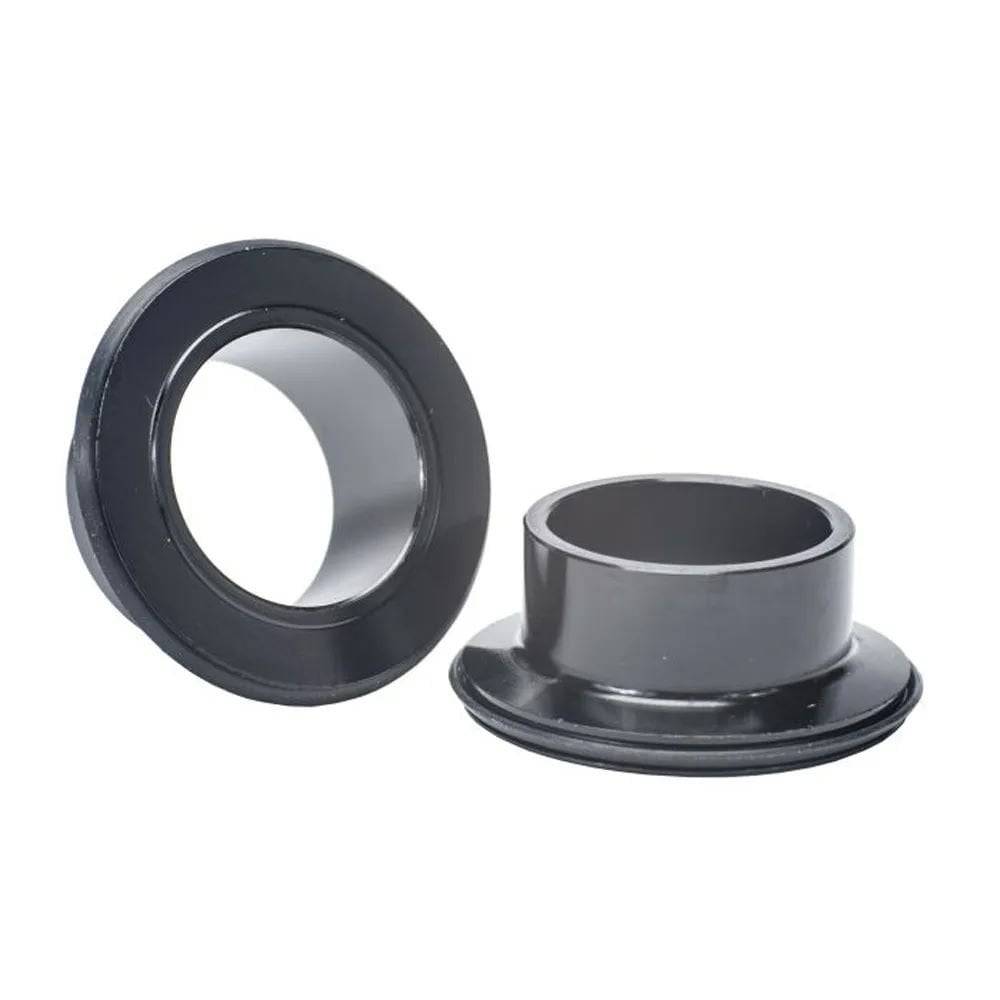 Stan's NoTubes E-Sync OS Neo End Caps for 20mm Boost E52 front hub upgrade, showing metal end caps on bike wheel component