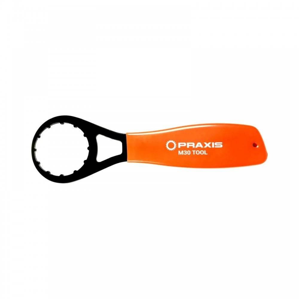 Praxis Works M30 Bottom Bracket Wrench for M30, BSA, BB30, and PF30 bicycle bottom brackets, workshop tool in hand.