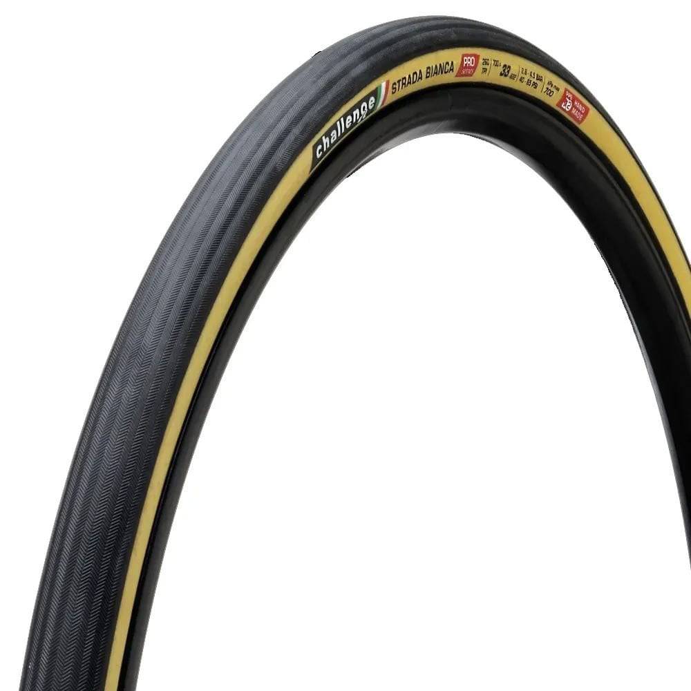 Challenge Strada Bianca Pro H CL tubeless gravel tire, 700x33 tan with 260 TPI, mounted on a bicycle wheel.