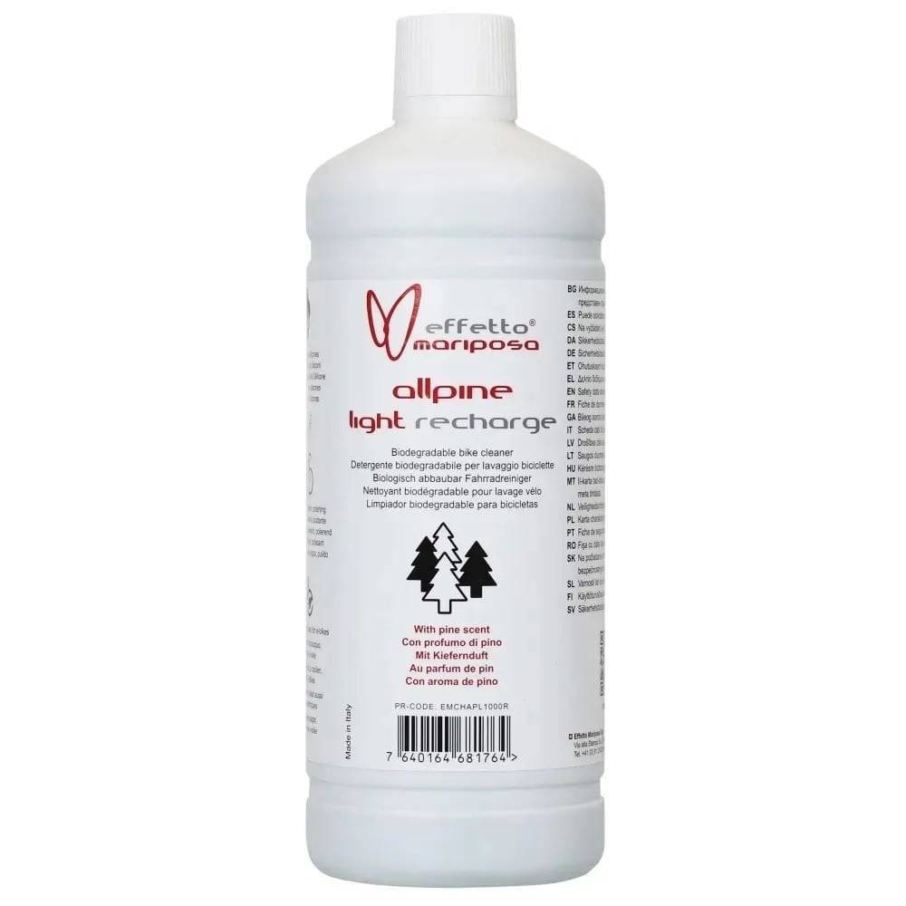 Effetto Mariposa Allpine Light Eco biodegradable bike cleaner in a workshop setting, emphasizing pine scent and eco-friendly formula.