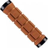 Lizard Skins Northshore dual-clamp lock-on grips for MTB and BMX bikes, black rubber handlebar grips with metal clamps.