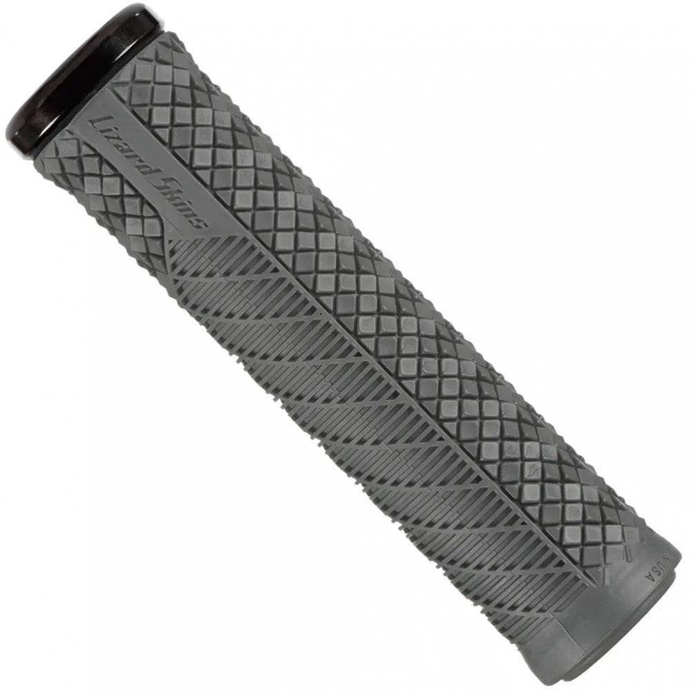 Lizard Skins Charger Evo bike grips with single-clamp lock-on design for MTB and BMX bikes, shown on a bicycle handlebar.