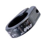 DMR Bikes single bolt grab seat clamp for bike seatpost, durable component spare part with metal finish and secure fastening.