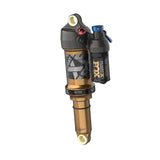 Fox Float X Factory rear shock for trail bikes, showcasing 2-position adjustable suspension component with branding and detailed design.