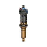 Fox Float X Factory rear shock absorber for trail bikes, showing the adjustable 2-position setting and high-performance components.
