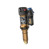 Fox Float X Factory rear shock for trail bikes, showing adjustable suspension components and high-performance suspension design.