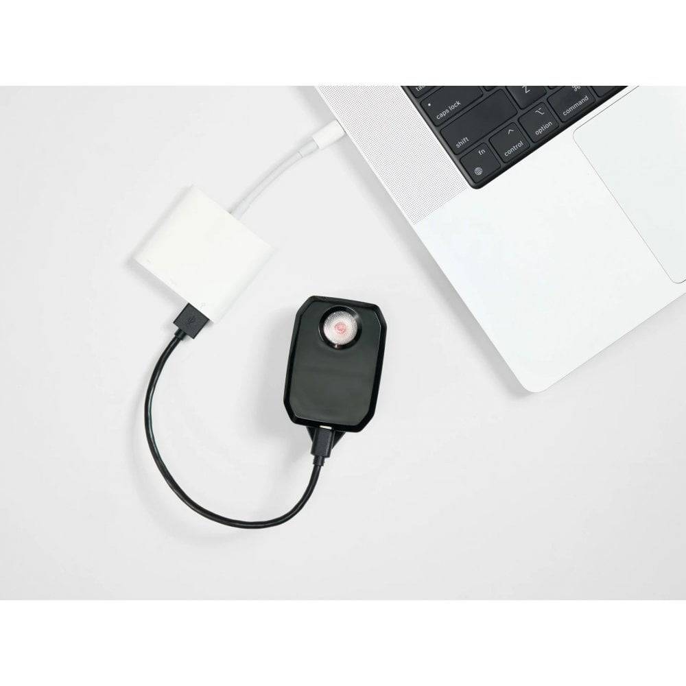 Trek CarBack Radar rear bike light in black with vehicle detection, mounted on a bicycle for high visibility and safety.