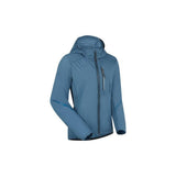 Madison Flux women's DWR stretch trail shorts with quick-adjust fit, shown in a casual outdoor setting.