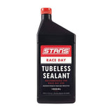 Stan's No Tubes Race Day Tubeless Tyre Sealant 1000ml bottle, designed for high-performance puncture protection on bicycle tires.