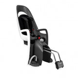 Hamax Caress child bike seat with lockable bracket and suspension system, mounted on bicycle for safe riding.