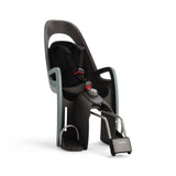 Hamax Caress child bike seat with lockable bracket and suspension system, showcasing the comfortable, secure seating for kids.