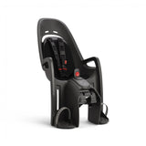 Hamax Zenith child bike seat with carrier adapter, showing the safe and comfortable design for children, mounted on a bike.