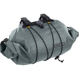 EVOC waterproof handlebar pack with Boa closure, 9L capacity, designed for cycling storage and accessories.