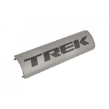 Trek District+ 9 RIB battery cover in metallic gunmetal black for e-bike components, shown on Trek electric bike.