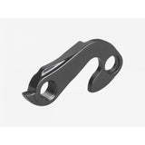 Trek 6061 black flip-flop rear derailleur hanger, 135mm quick-release, rear drive side bicycle component on black background
