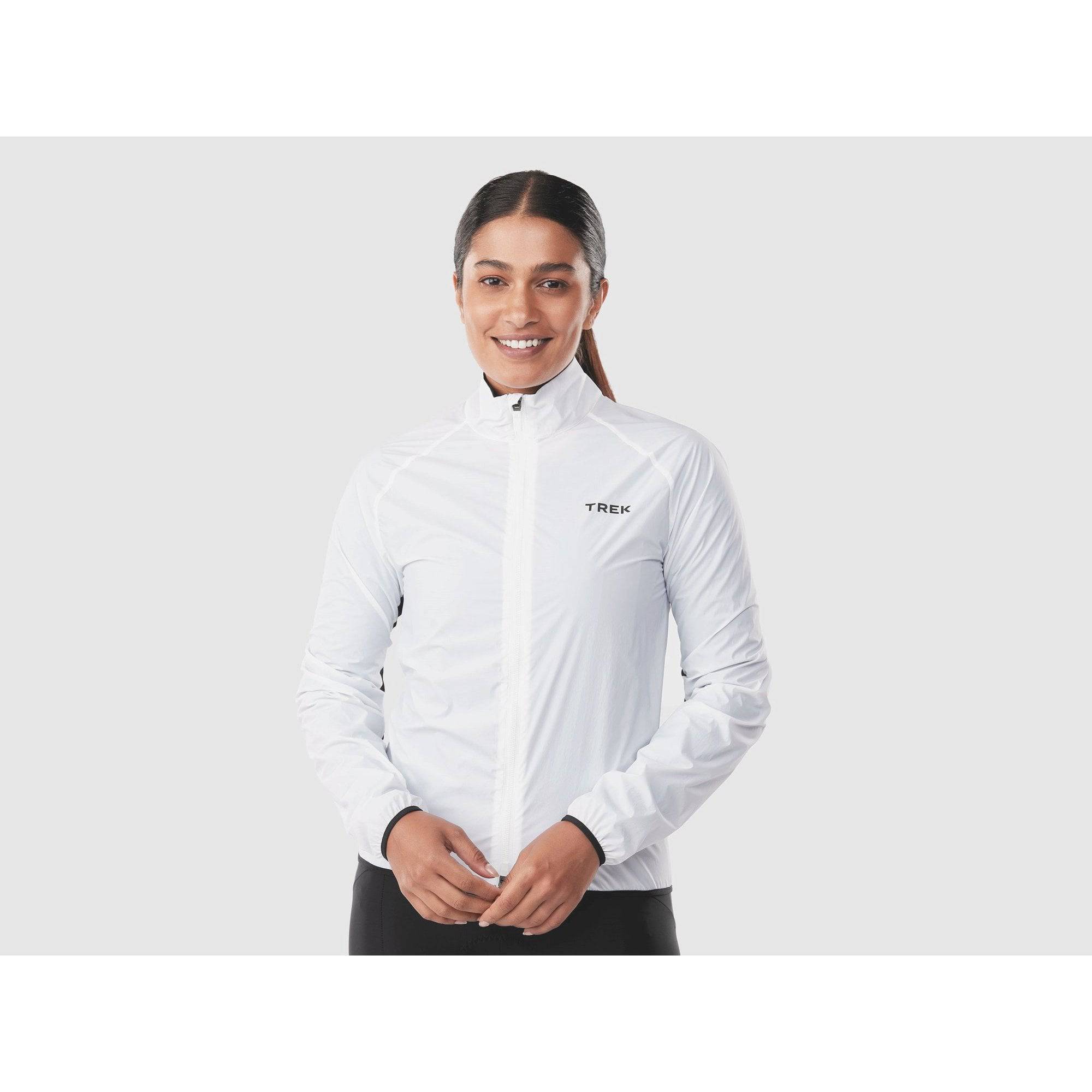 Trek Circuit Women's lightweight wind-resistant cycling jacket, packable and suitable for outdoor riding in variable weather.