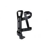 Trek eco-friendly left side load recycled water bottle cage mounted on a bike, showcasing sustainable cycling accessories.