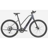 Trek Dual Sport+ 2 Stagger LT 2025 women's electric hybrid bike with low-step frame, suitable for commuting and off-road riding.