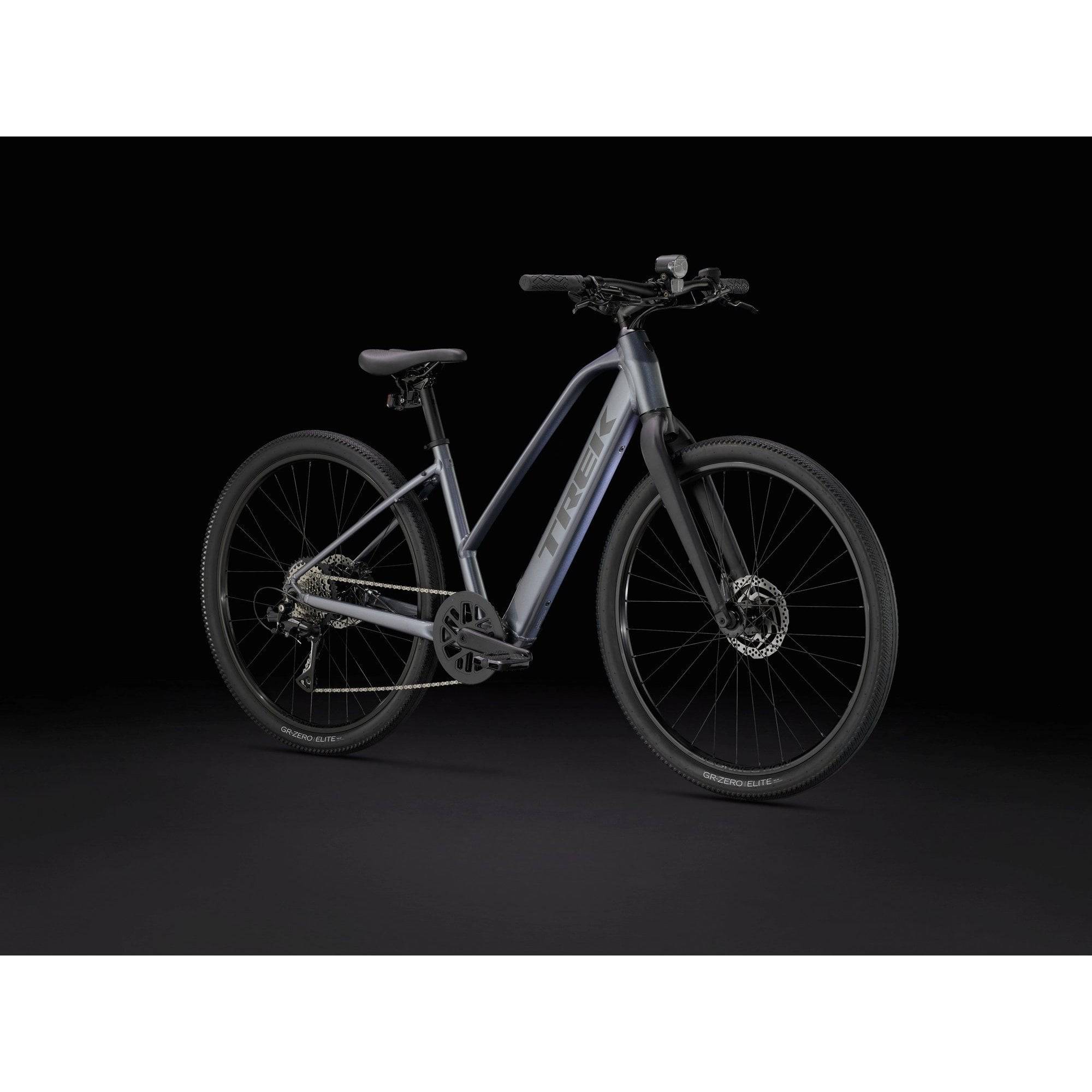 Trek Dual Sport+ 2 Stagger LT 2025 women's low-step electric hybrid bike for commuting and off-road riding, with a sleek frame.