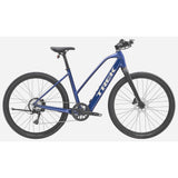 Trek Dual Sport+ 2 Stagger LT 2025 women's electric hybrid bike with low-step frame, suitable for commuting and off-road riding.