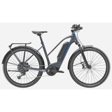 Trek Allant+ 6 Stagger 2025 women's electric hybrid bike for urban commuting, shown with sleek frame and electric motor.